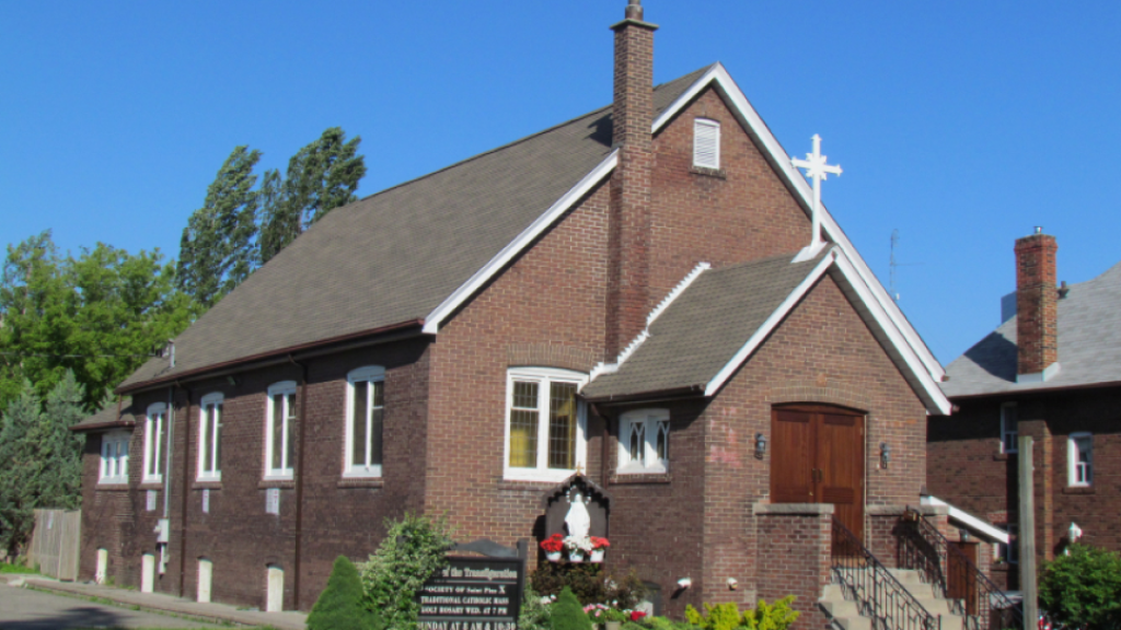 Image of the Church of the Transfiguration in Etobicoke from the outside on a summer day with a bright blue sky